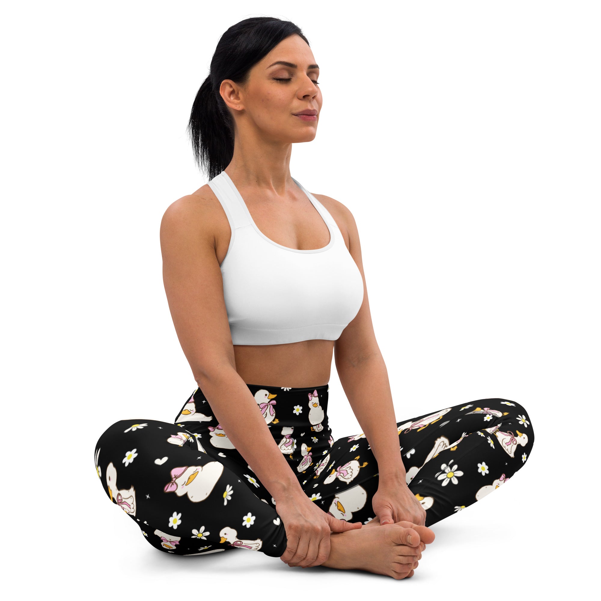 Black womens buttery soft high waisted yoga leggings with playful white ducks pink bows and yellow flowers pattern