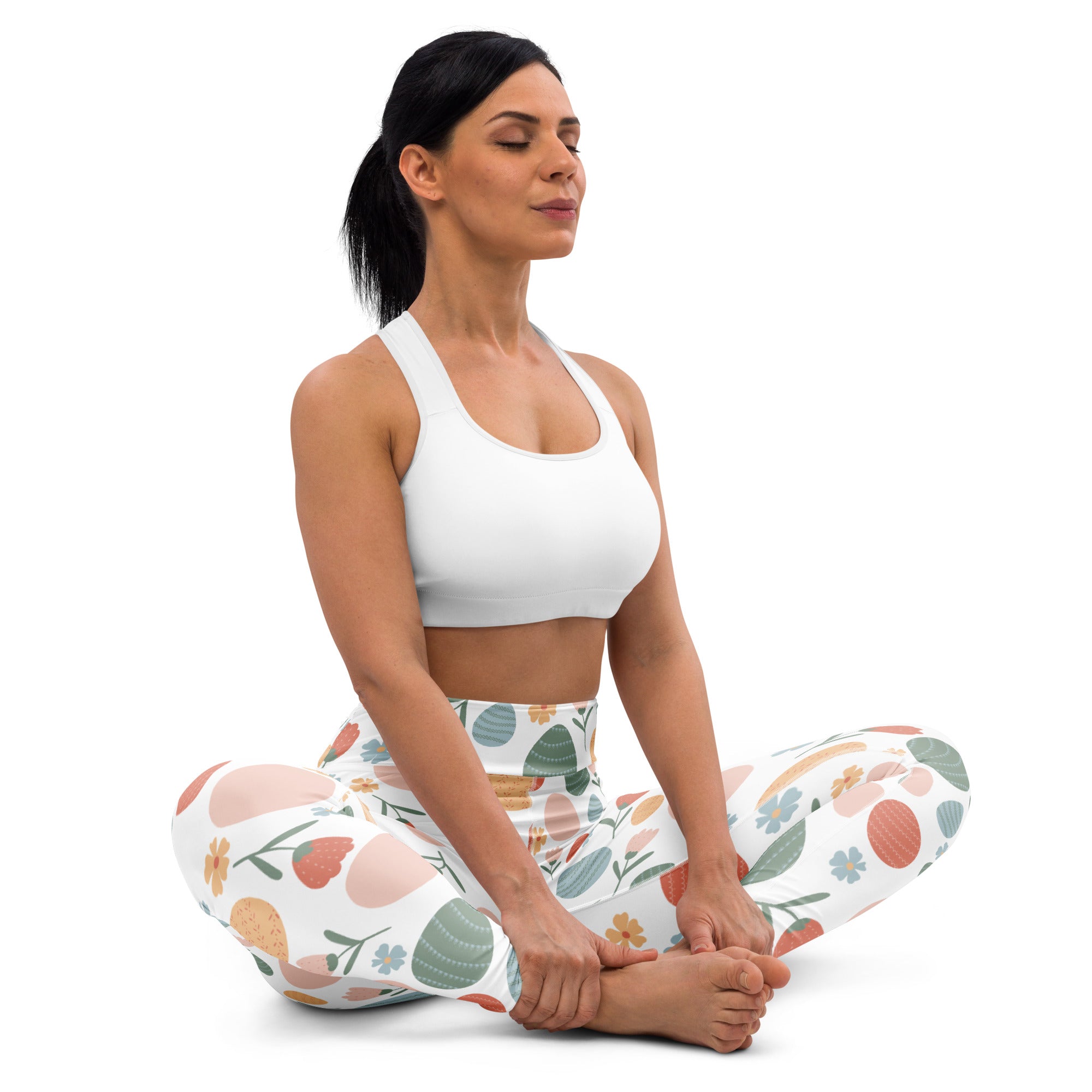 Women’s white buttery soft high waisted yoga leggings with pastel pink green and orange floral botanical print