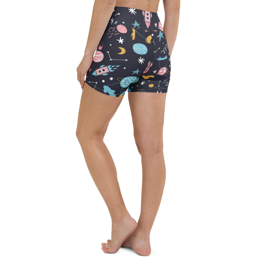 Dark blue high waisted buttery soft yoga shorts with colorful outer space planets rockets and stars pattern