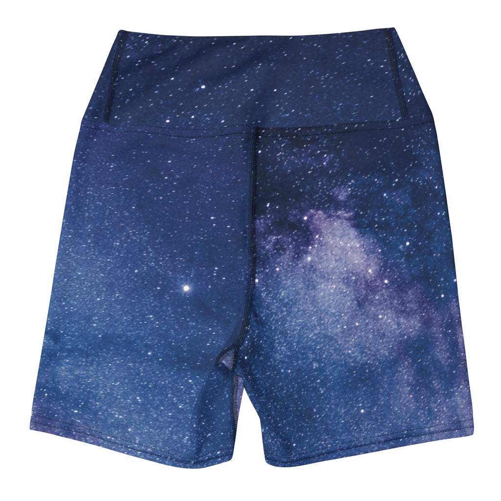 Dark blue high waisted buttery soft women’s yoga shorts with realistic purple and white galaxy print stars and nebulae