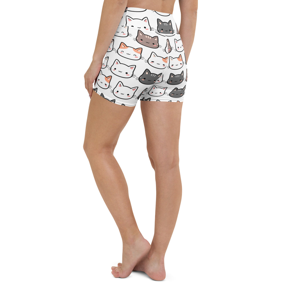 Women’s white high waisted buttery soft yoga shorts with a colorful cartoon cat pattern for active wear