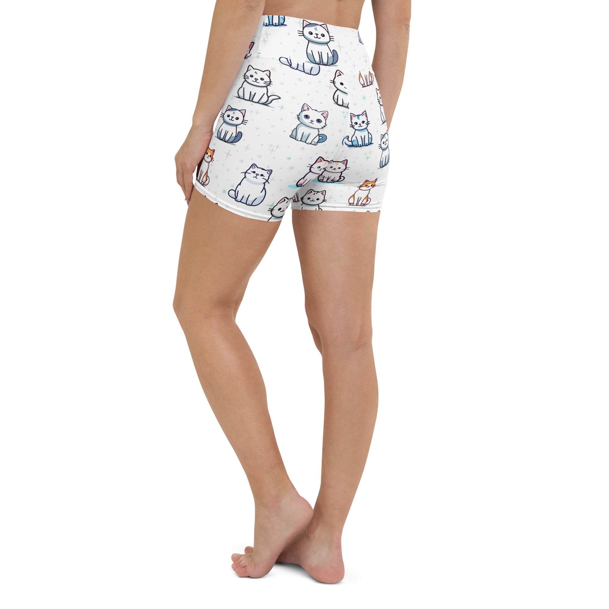 White high waisted buttery soft women’s yoga shorts with a colorful playful cartoon cat pattern