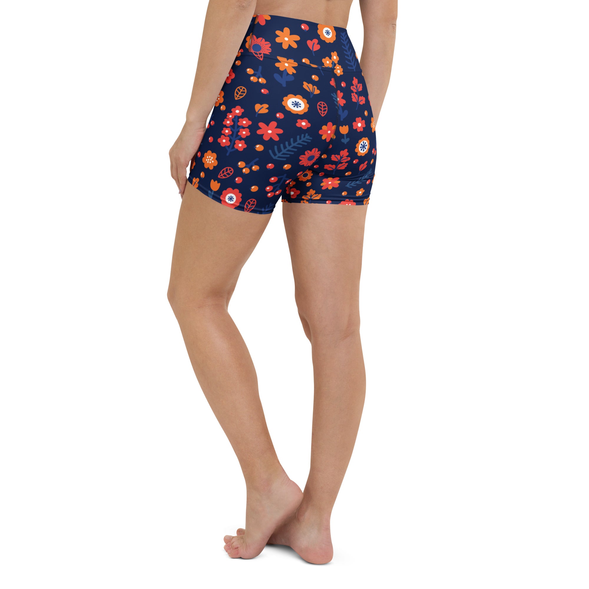 Women’s navy high waisted buttery soft yoga shorts with vibrant orange red and white floral pattern