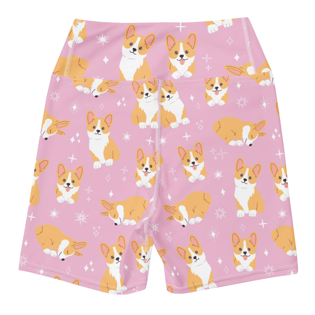 Women’s pink high waisted buttery soft yoga shorts with tan and white cartoon corgi pattern and starburst designs