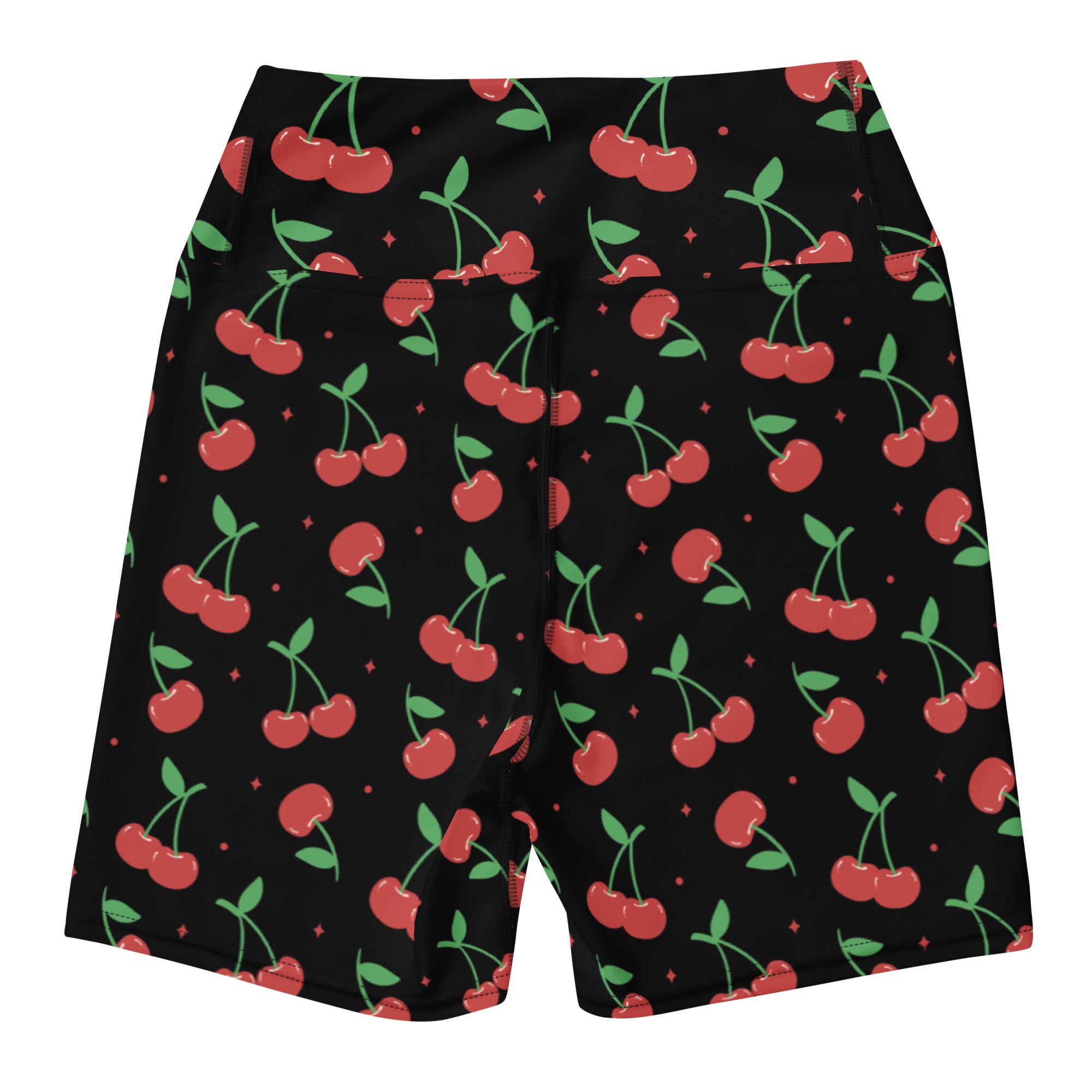 Women’s black cherry yoga shorts with high waisted buttery soft fabric and a playful red cherry pattern with green stems