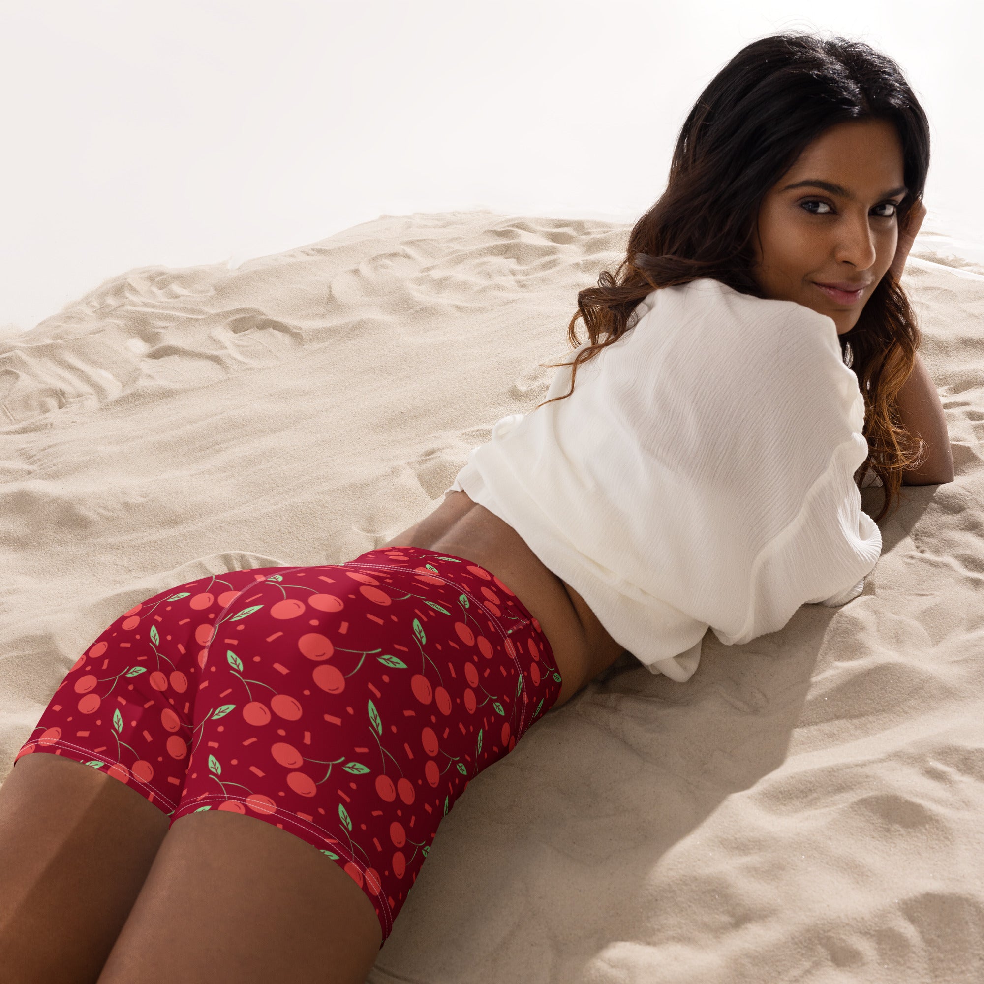 Women’s high waisted buttery soft red cherry print yoga shorts with green leaves and small orange accents