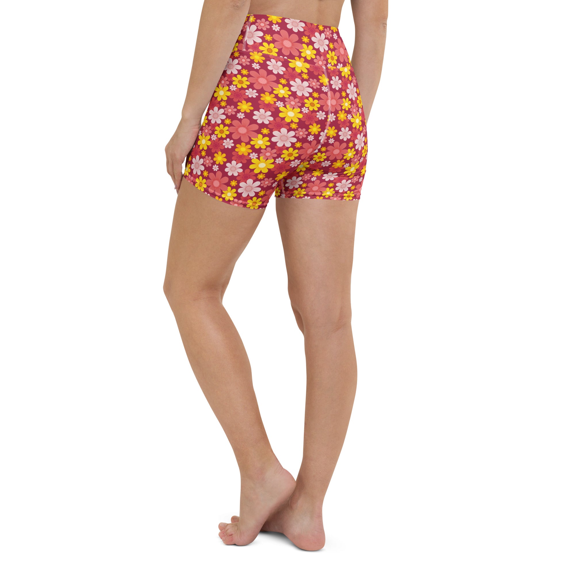 Women’s high waisted buttery soft yoga shorts with pink and yellow floral pattern for active wear