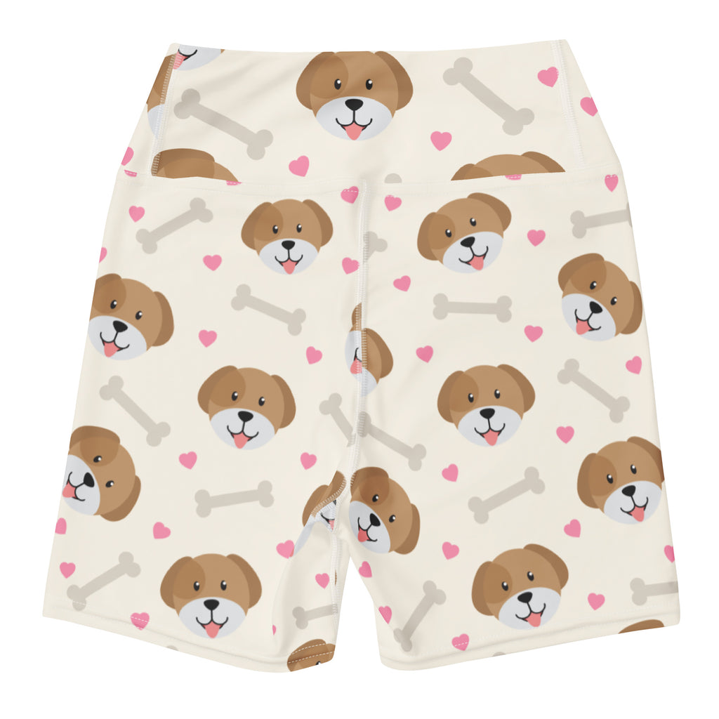 Cream-colored women’s high waisted buttery soft yoga shorts with playful brown puppy faces pink hearts and gray bones pattern