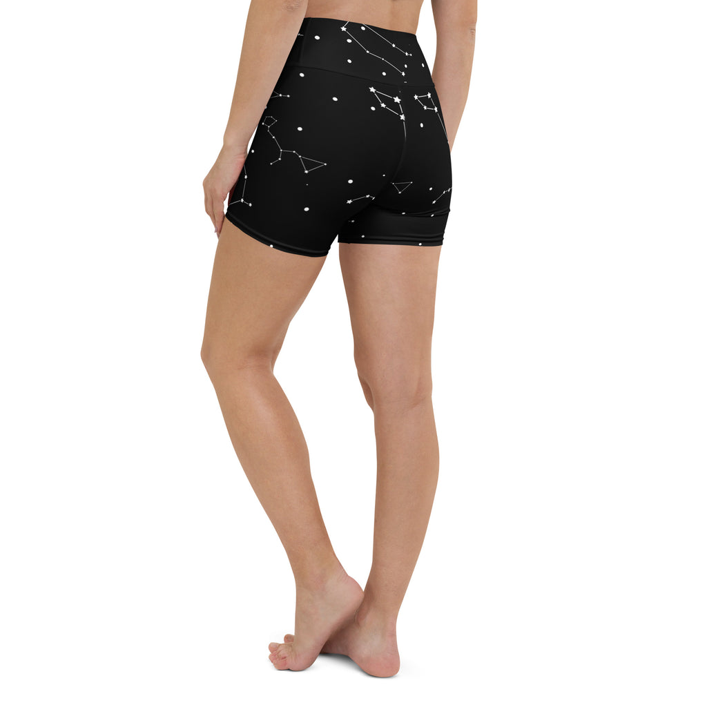 Black high waisted buttery soft women’s yoga shorts with white realistic constellation pattern for activewear