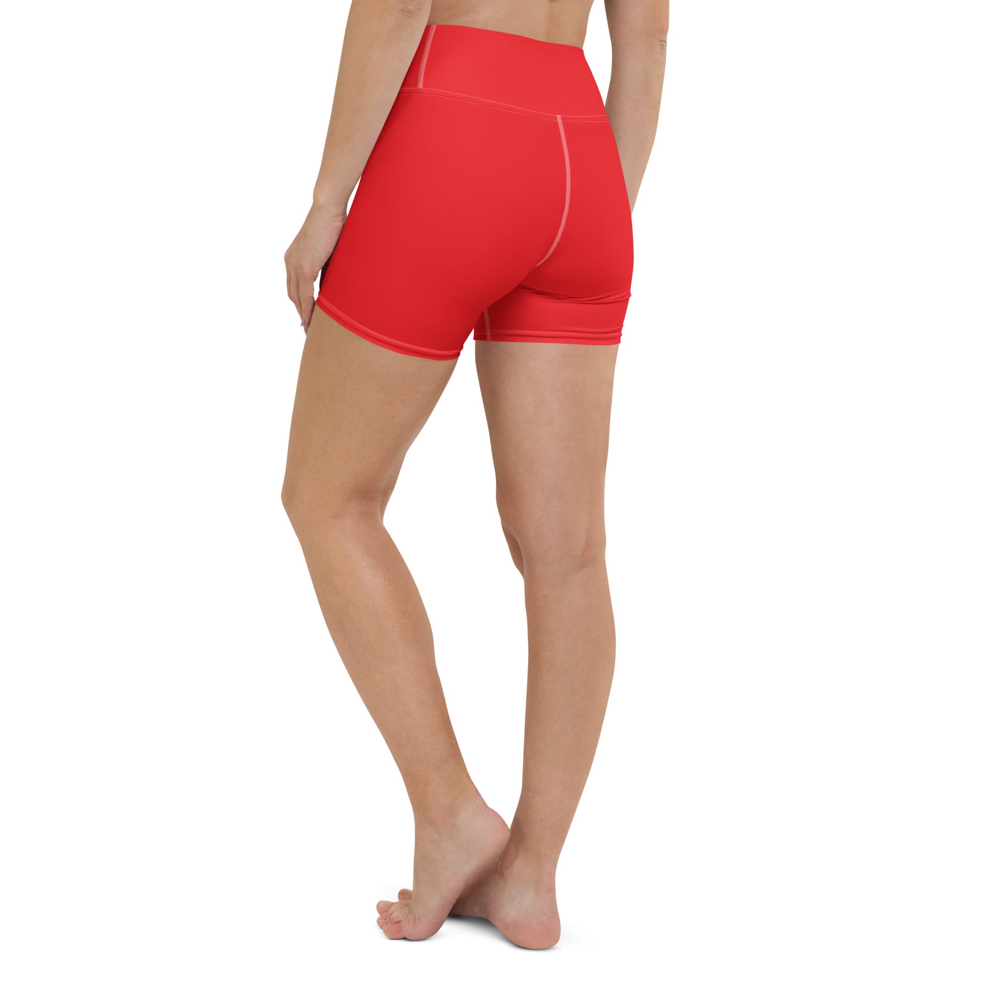 Women’s buttery soft red high waisted yoga shorts with a snug fit and subtle white stitching along the seams