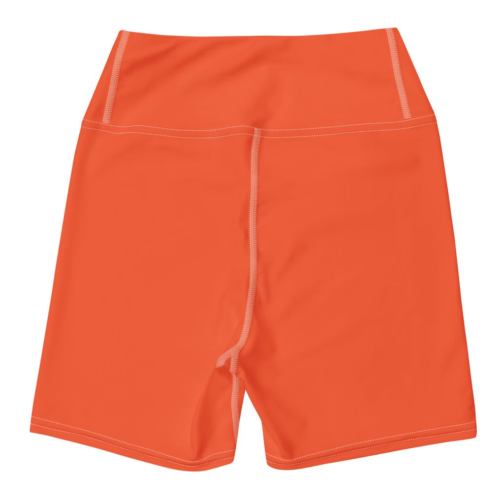 Women’s buttery soft orange high waisted yoga shorts with matching stitching and a central zipper detail