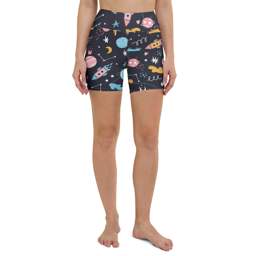 Dark blue high waisted buttery soft women’s outer space yoga shorts with colorful rockets planets and stars