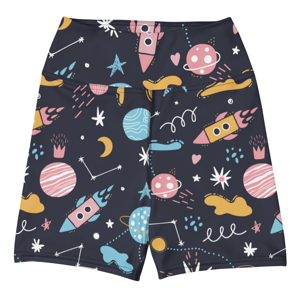 Dark navy high waisted buttery soft women’s yoga shorts with playful pink blue and yellow space rockets and planets pattern