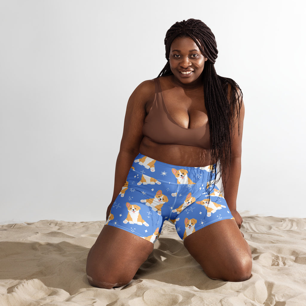 Women’s blue corgi dog yoga shorts featuring a playful orange and white corgi pattern with star accents and buttery soft fabric