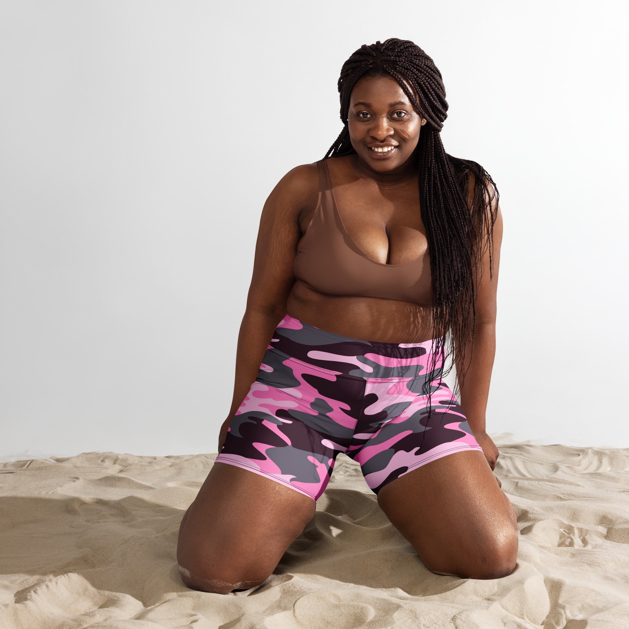 Women’s high waisted buttery soft yoga shorts in pink and black camouflage pattern for active wear