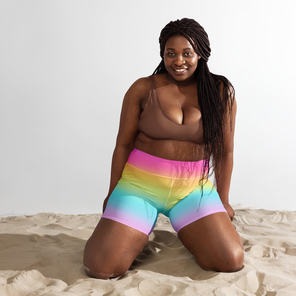 Women’s bright rainbow yoga shorts high waisted buttery soft fabric with smooth rainbow gradient from pink to blue