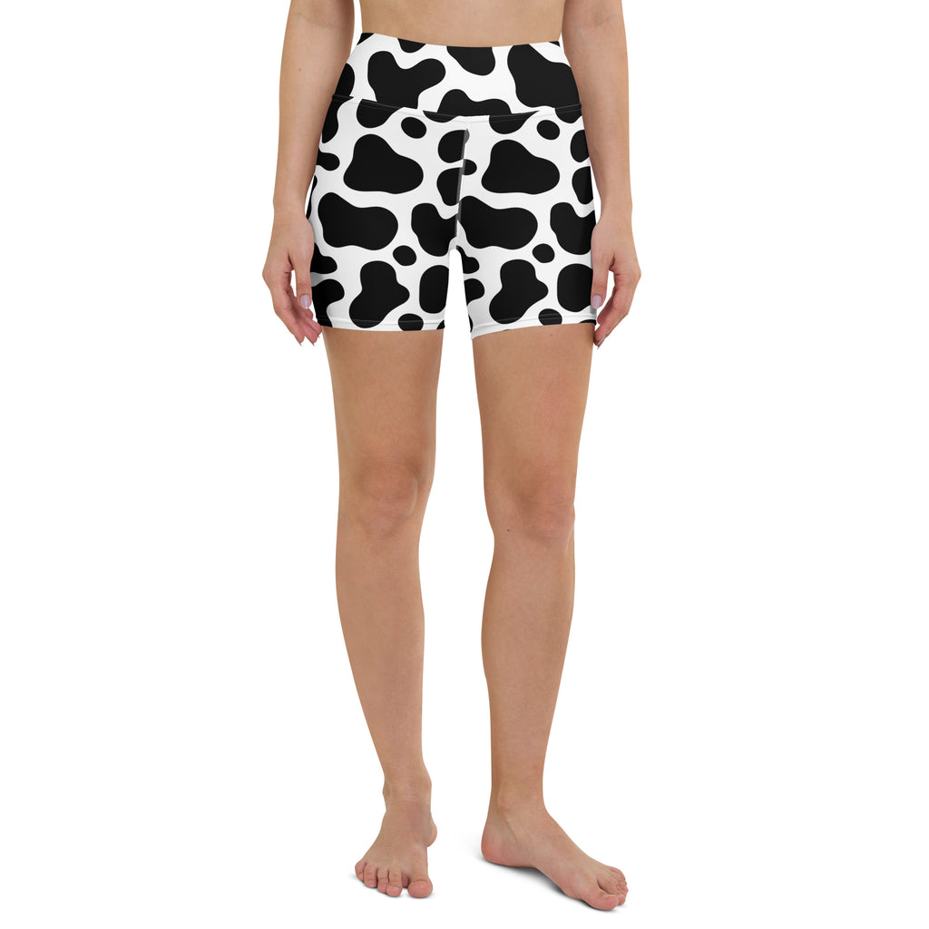 Women’s high waisted buttery soft active yoga shorts with black and white cow print design
