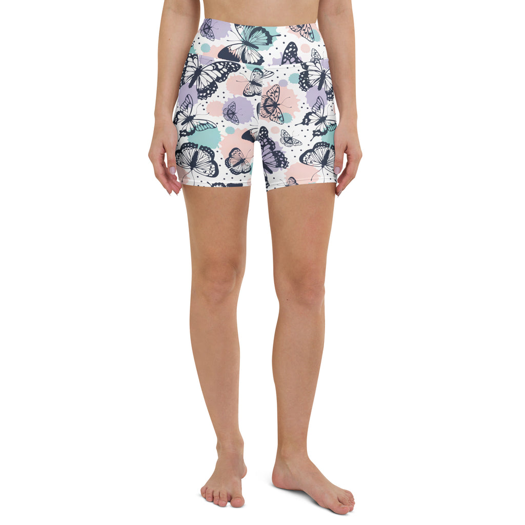 Women’s high waisted buttery soft white butterfly patterned yoga shorts with pastel accents and black outlines