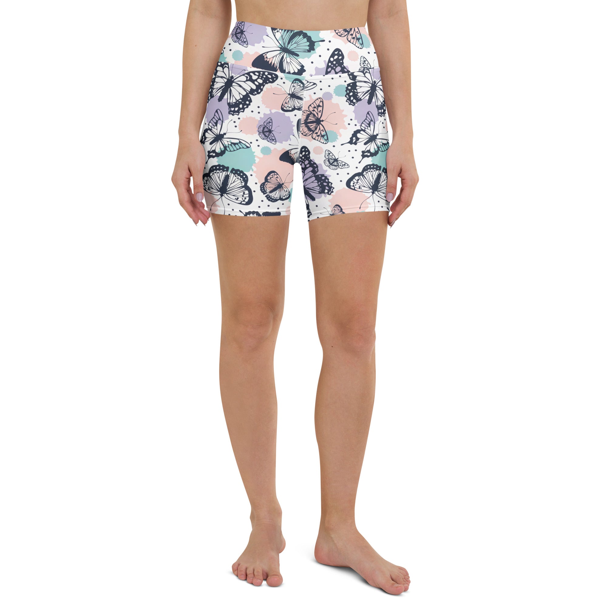 Women’s high waisted buttery soft white butterfly patterned yoga shorts with pastel accents and black outlines