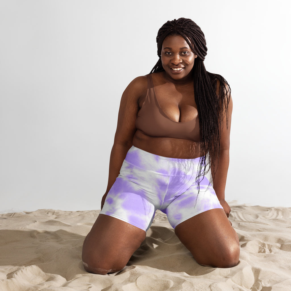 Women’s purple and white tie dye high waisted buttery soft yoga shorts for activewear use visible from the back