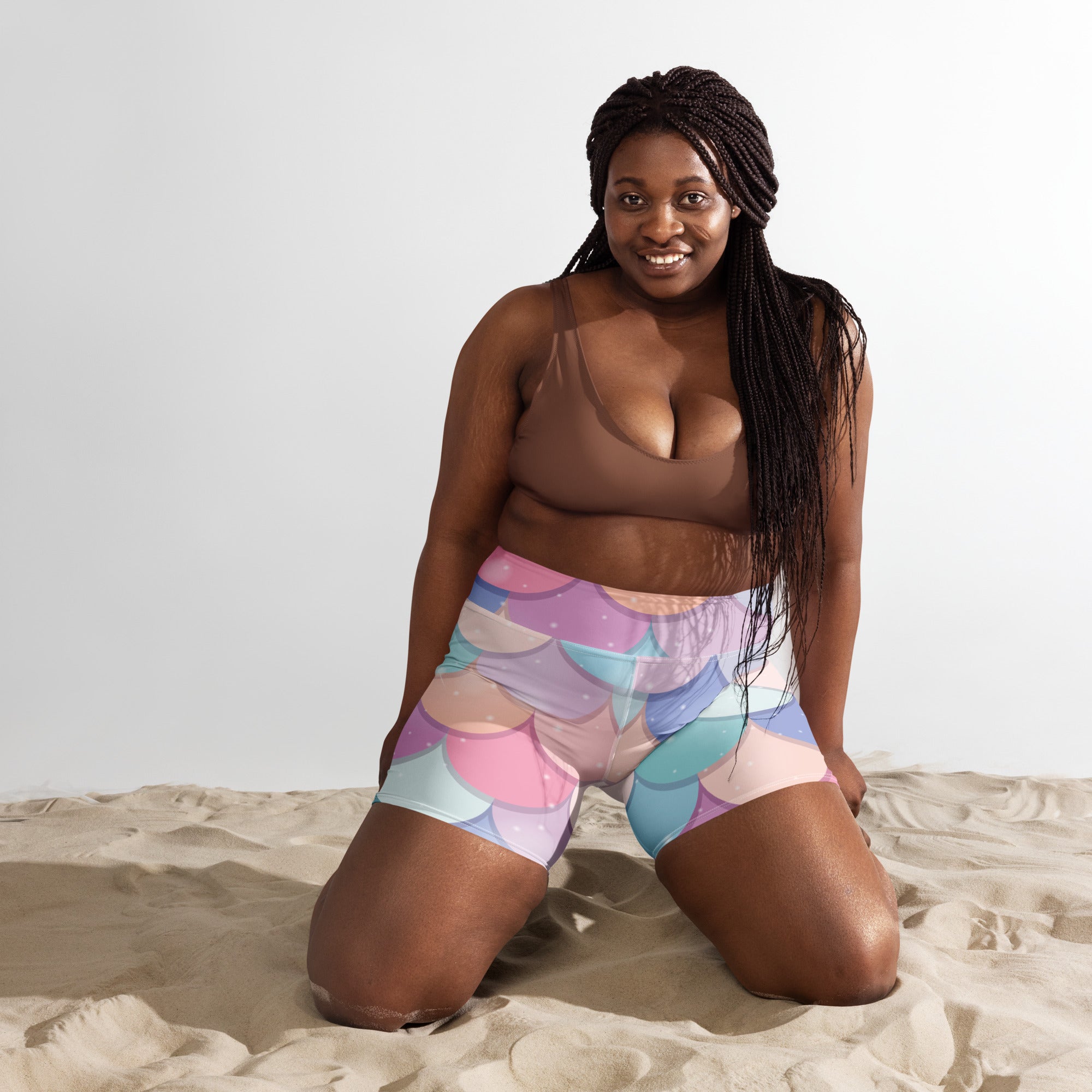 Women’s rainbow mermaid yoga shorts with high waist buttery soft fabric in pastel pink blue and purple hues