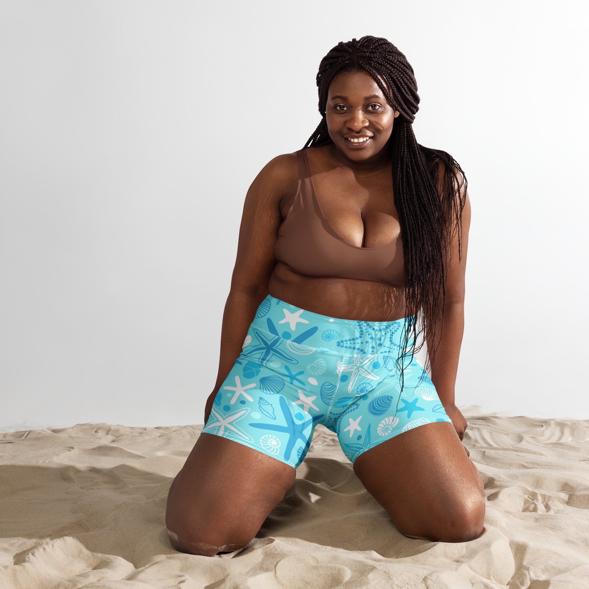 Women’s bright turquoise starfish and shells yoga shorts high waisted buttery soft activewear with playful pattern