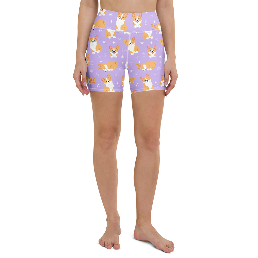 Women’s purple high waisted buttery soft yoga shorts with a tan and white cartoon corgi pattern