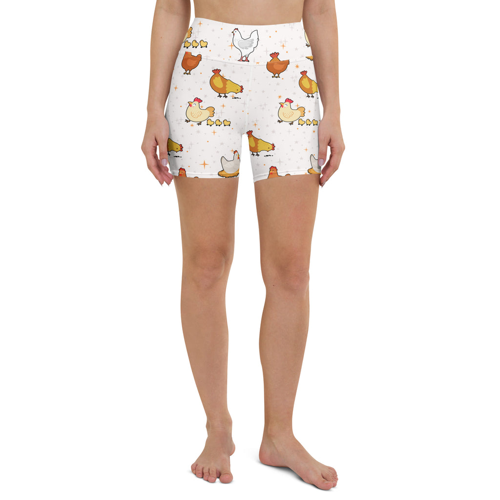 White high waisted buttery soft yoga shorts with playful orange yellow and white cartoon chickens and chicks pattern