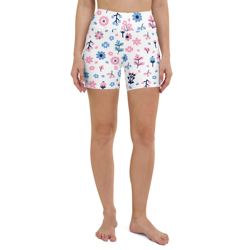 White high waisted buttery soft women’s yoga shorts with pink and blue flowers and black stems floral pattern