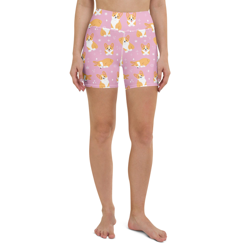 Women’s pink high waisted buttery soft yoga shorts with playful cartoon corgis and sparkles pattern