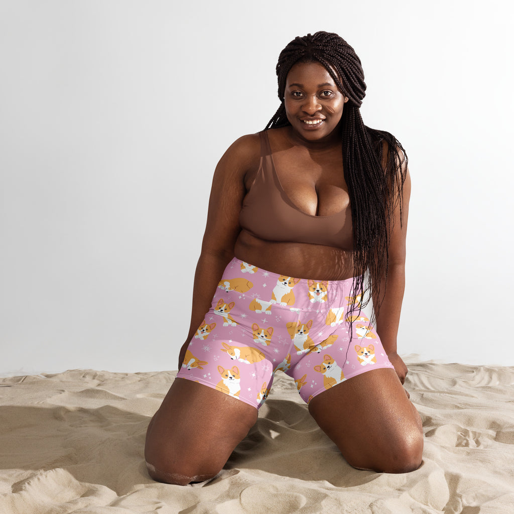 Women’s pink high waisted buttery soft yoga shorts with playful corgi dog and white star pattern