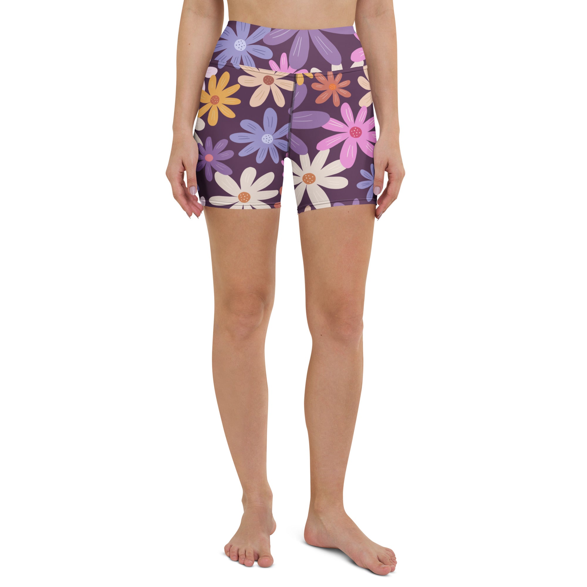 Women’s purple floral high waisted yoga shorts with colorful daisies in buttery soft fabric for activewear