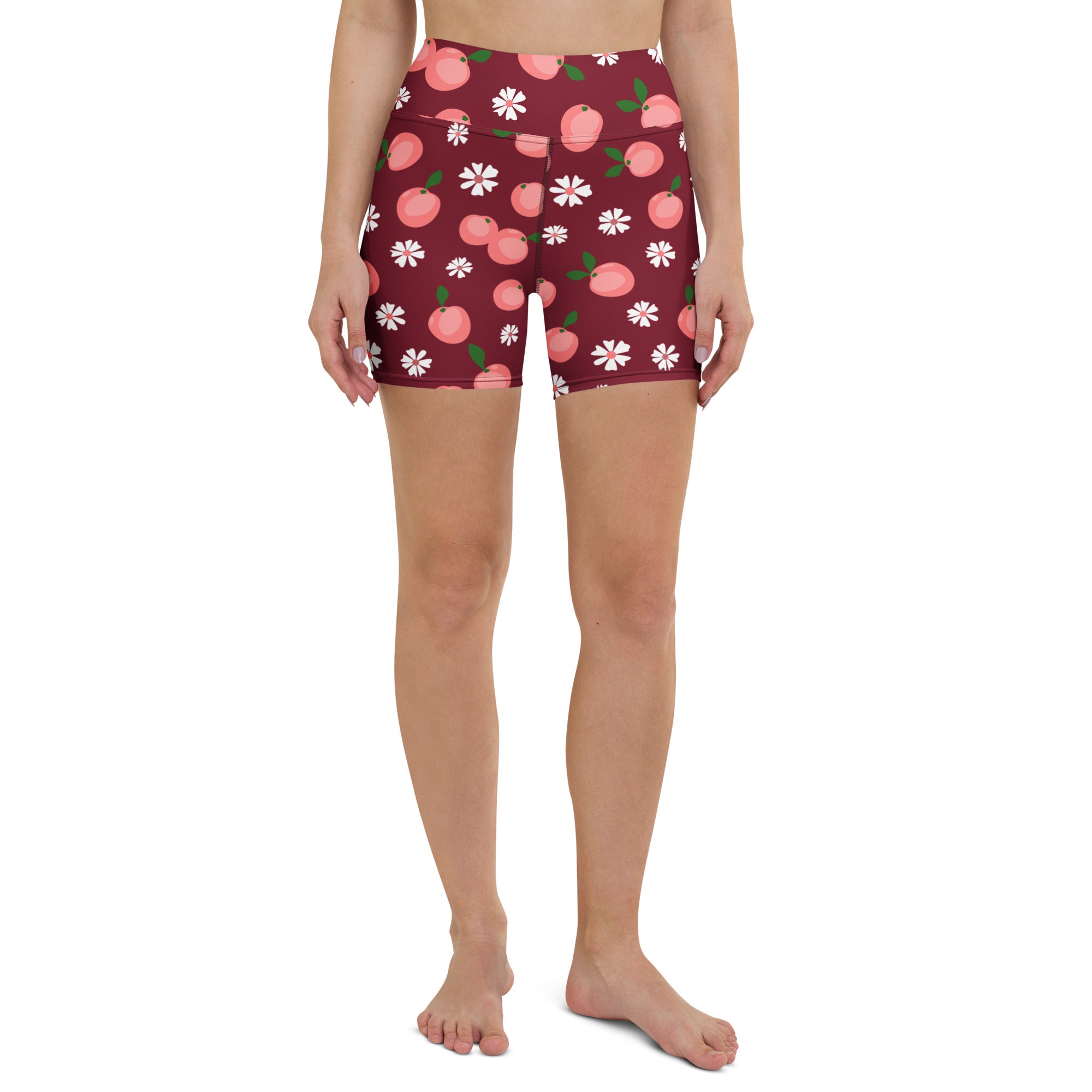 Women’s maroon high-waisted buttery soft yoga shorts with playful pink peaches and white daisies pattern