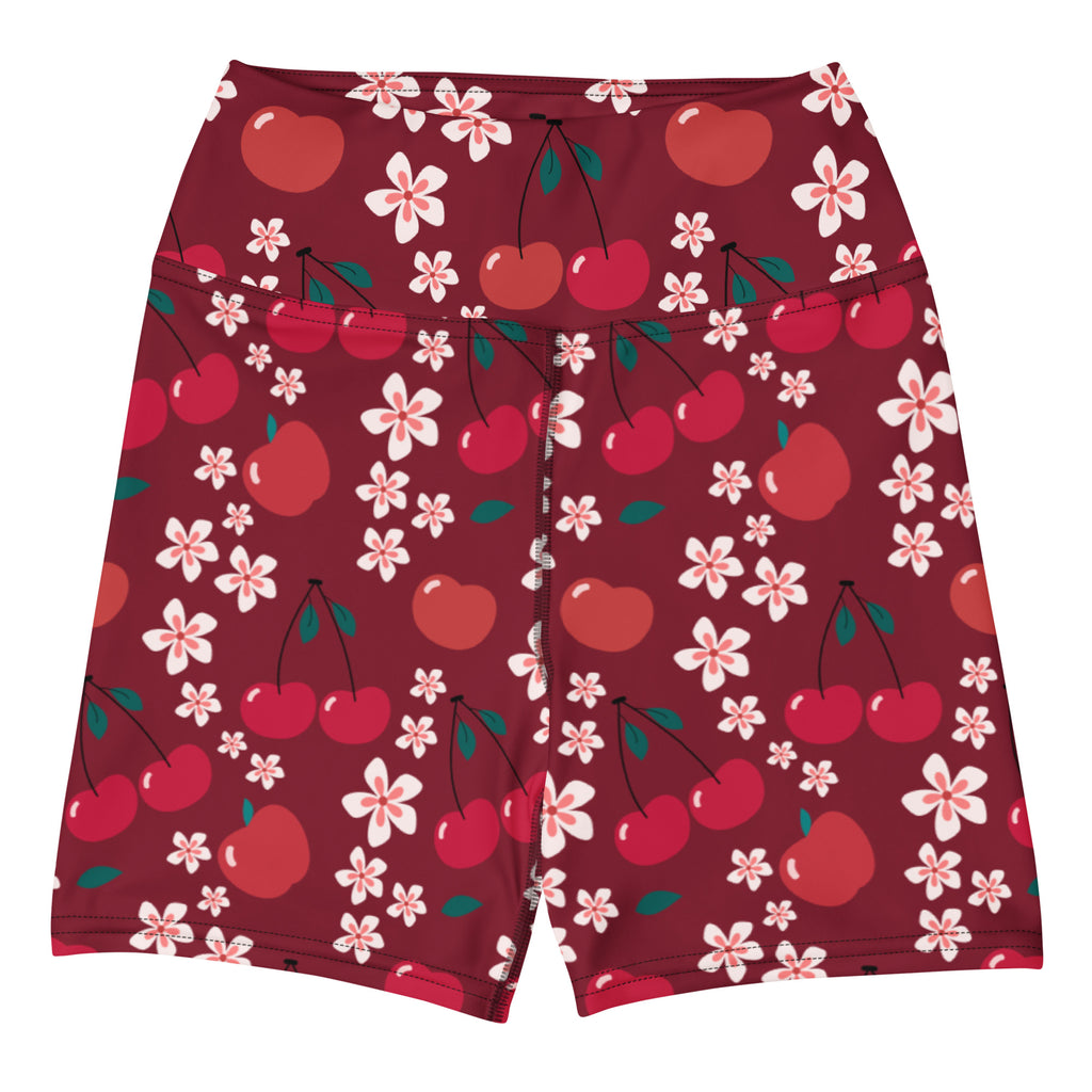 Women’s high waisted buttery soft maroon yoga shorts with a playful red cherry and white blossom pattern