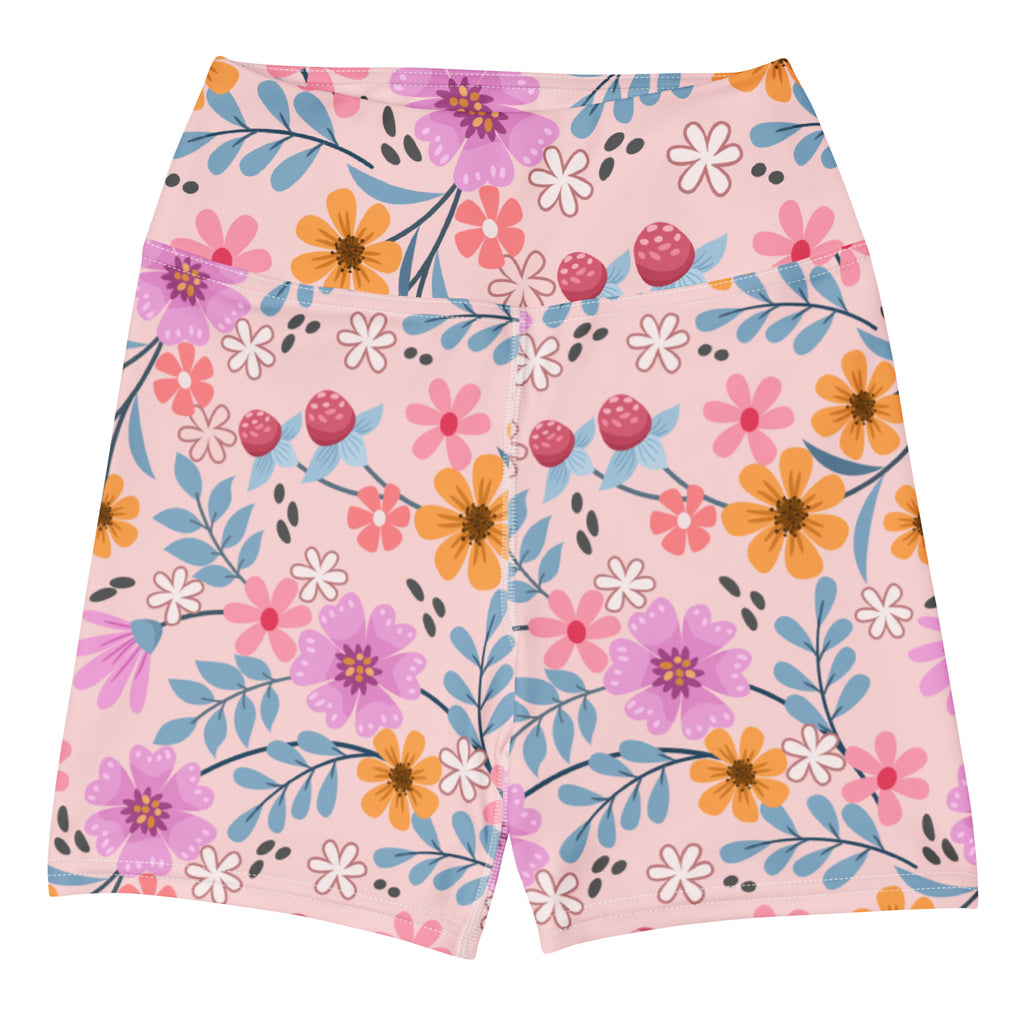 Women’s pink floral yoga shorts with high waisted design buttery soft fabric and vibrant purple orange white flowers