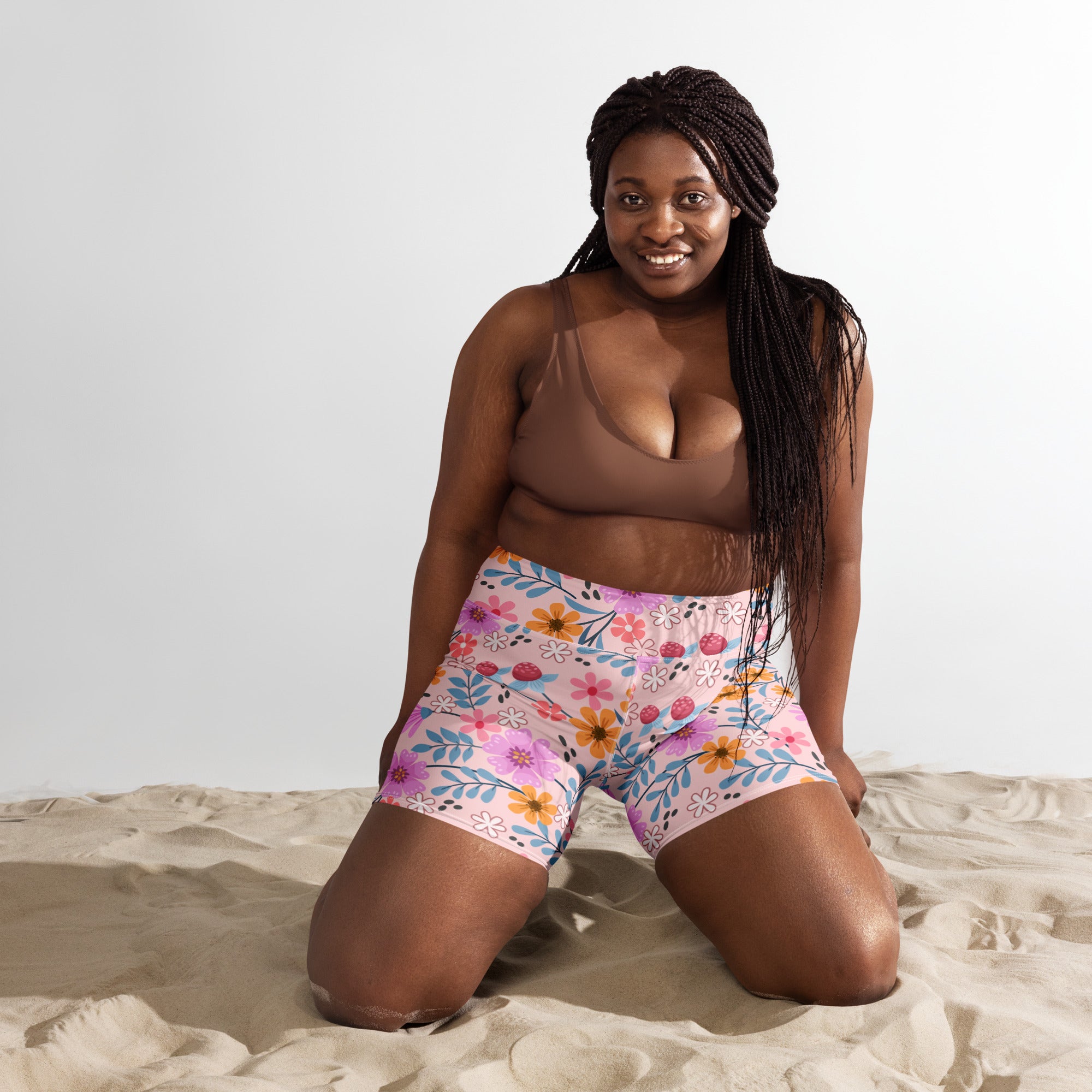 Women’s pink floral yoga shorts featuring high waisted buttery soft stretchy fabric for active wear