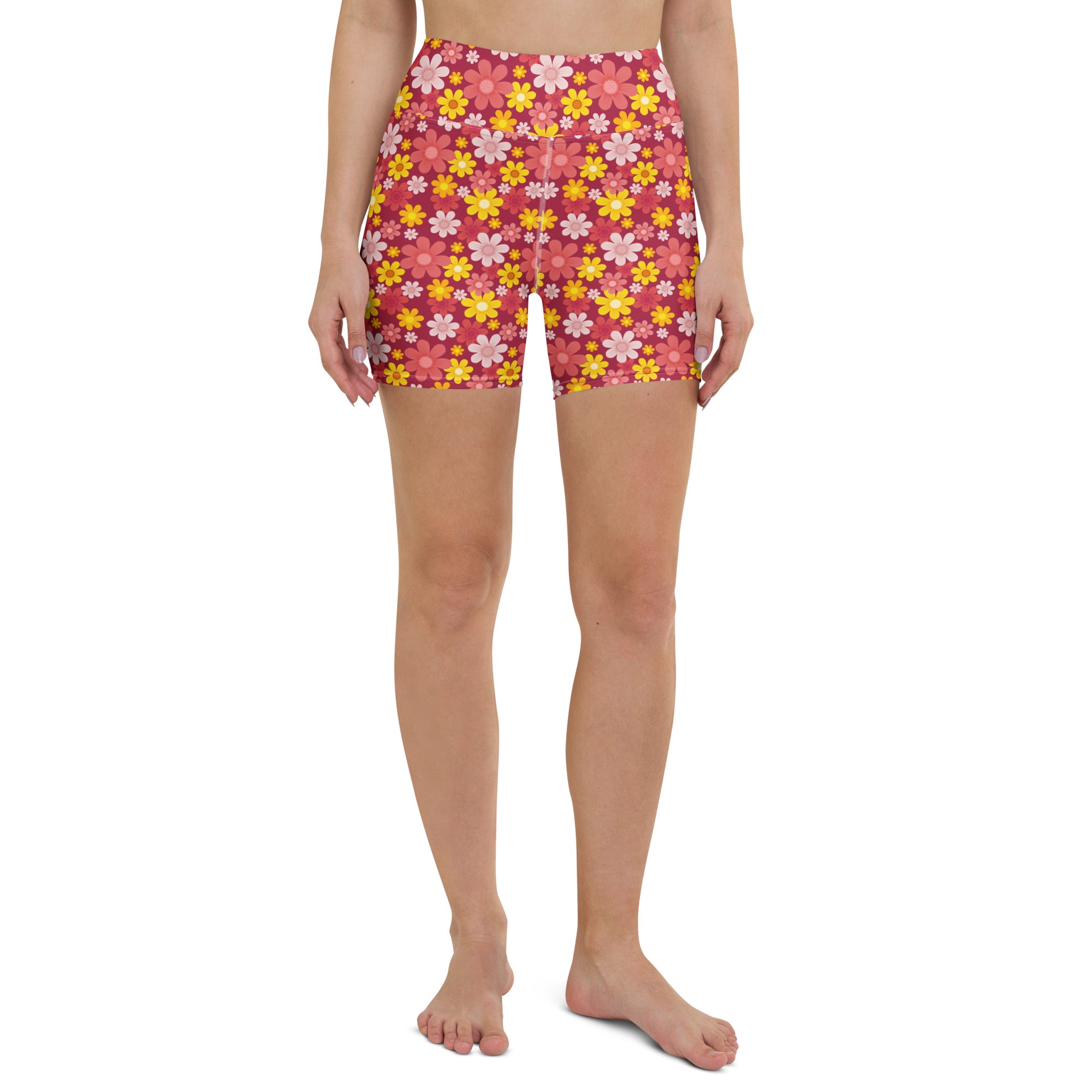 Women’s high waisted buttery soft pink and yellow floral yoga shorts with vibrant floral pattern for active wear