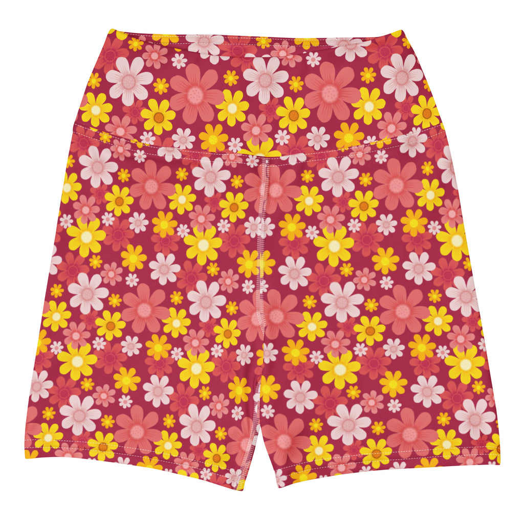 Women’s red floral high-waisted yoga shorts with buttery soft fabric featuring pink and yellow daisies with white accents