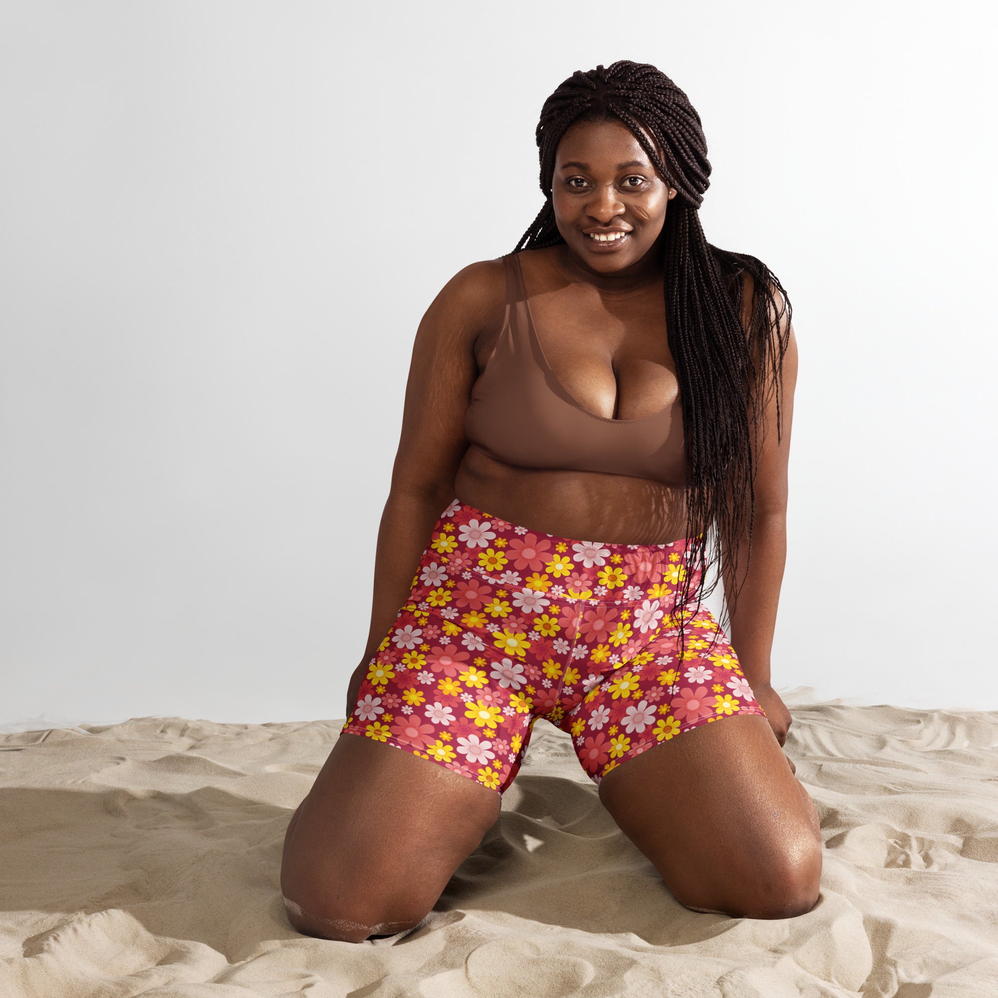 Women’s red floral yoga shorts with high waisted fit buttery soft fabric and pink yellow white flower pattern