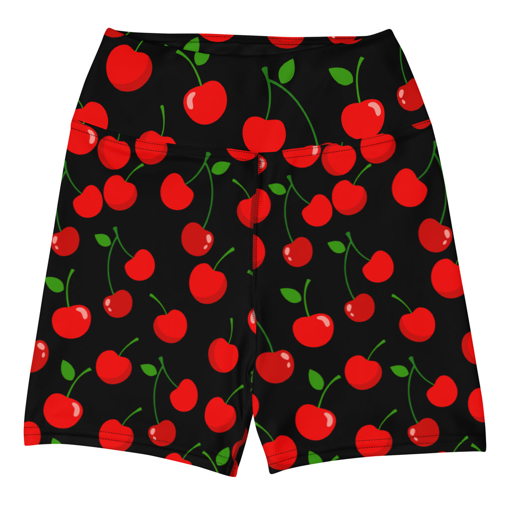Women’s high waisted buttery soft black yoga shorts with vibrant red cherry pattern and green leaves for activewear
