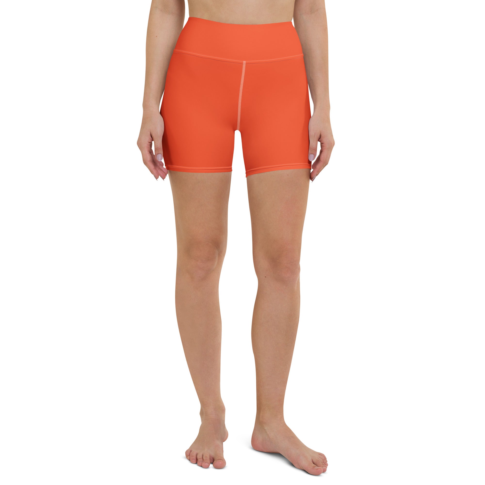 Bright orange high waisted buttery soft yoga shorts with seamless stretchy fabric for active wear