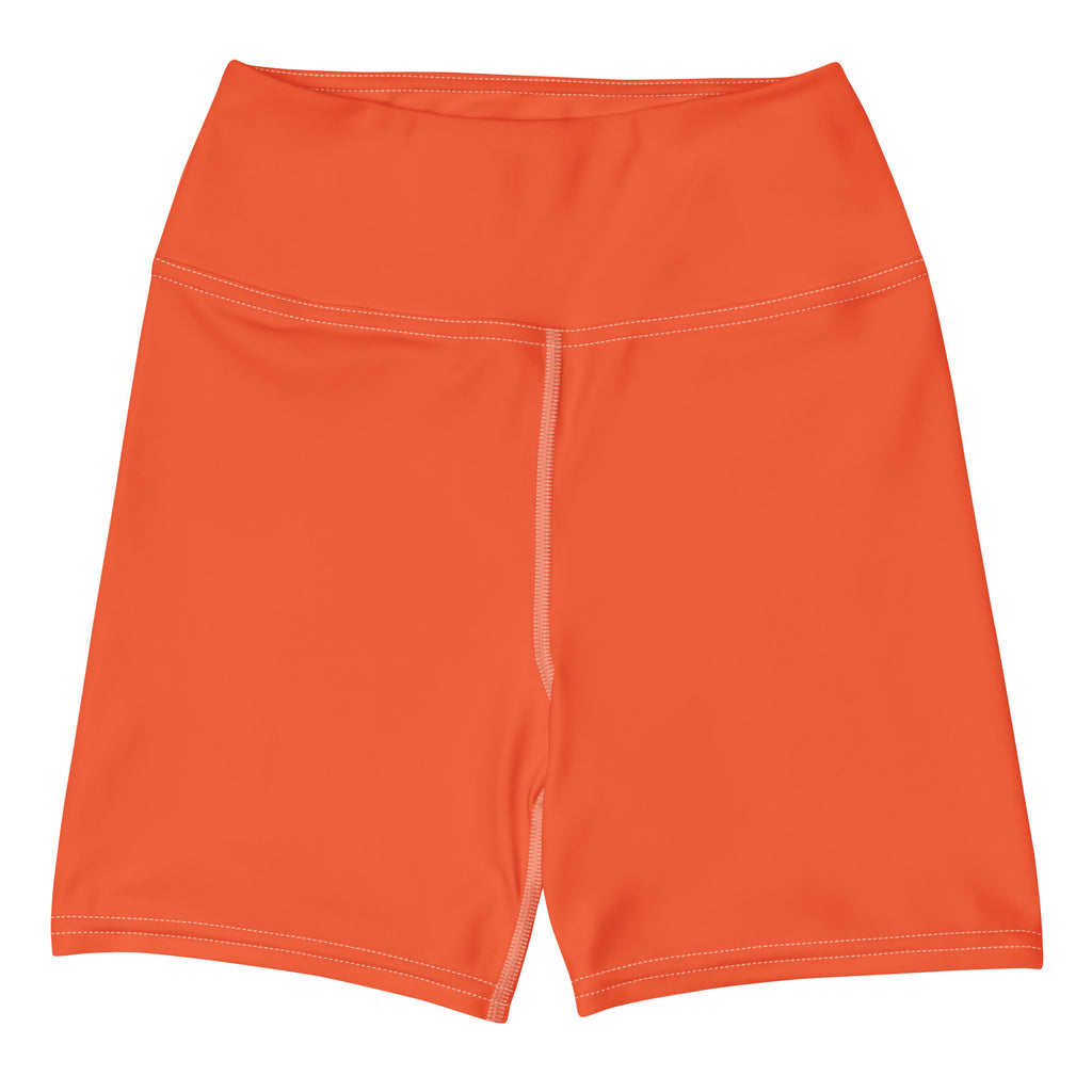 Bright orange high waisted buttery soft women’s yoga shorts with sleek form fitting design and subtle white stitching