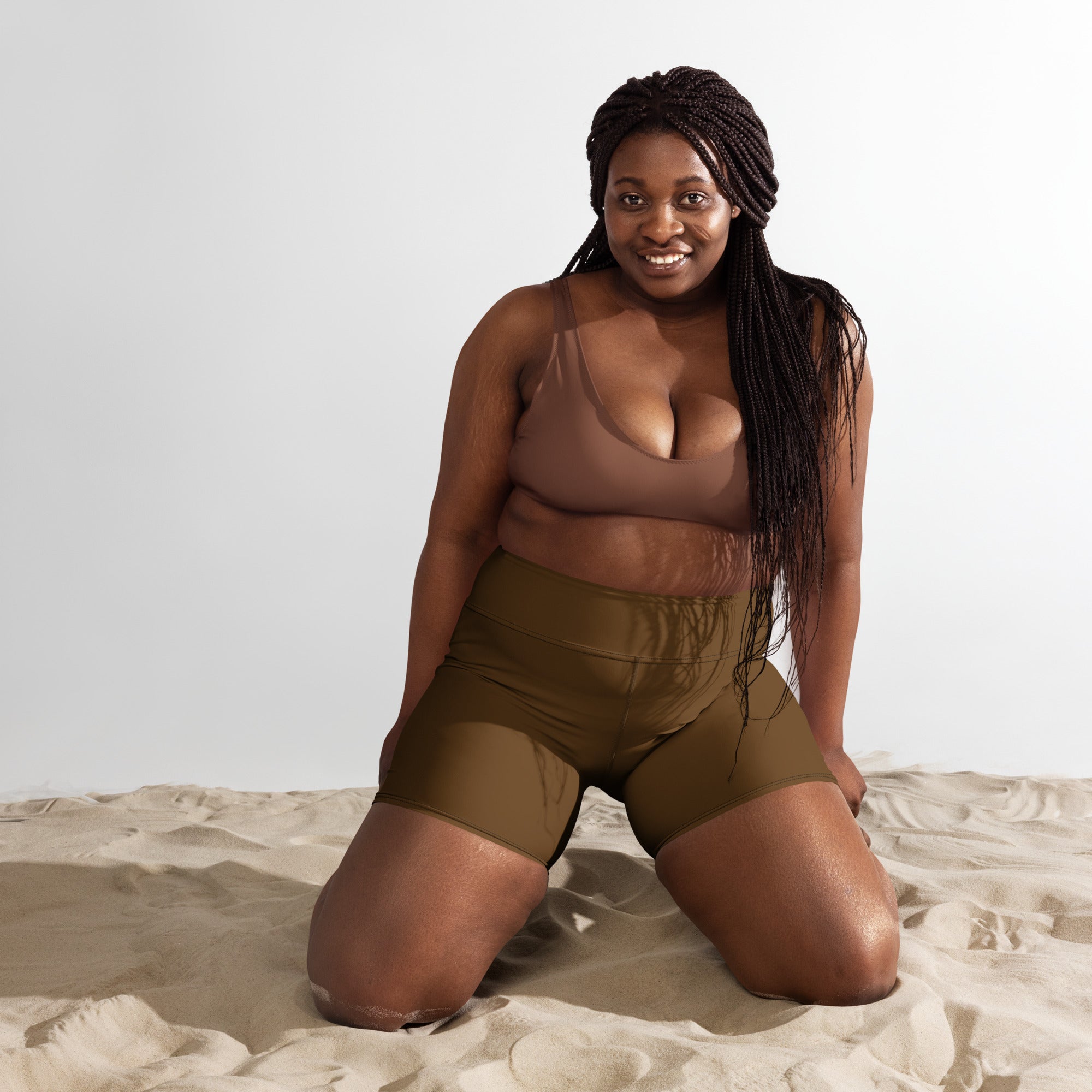Olive green high waisted buttery soft women’s yoga shorts made from soft active fabric for comfortable workouts