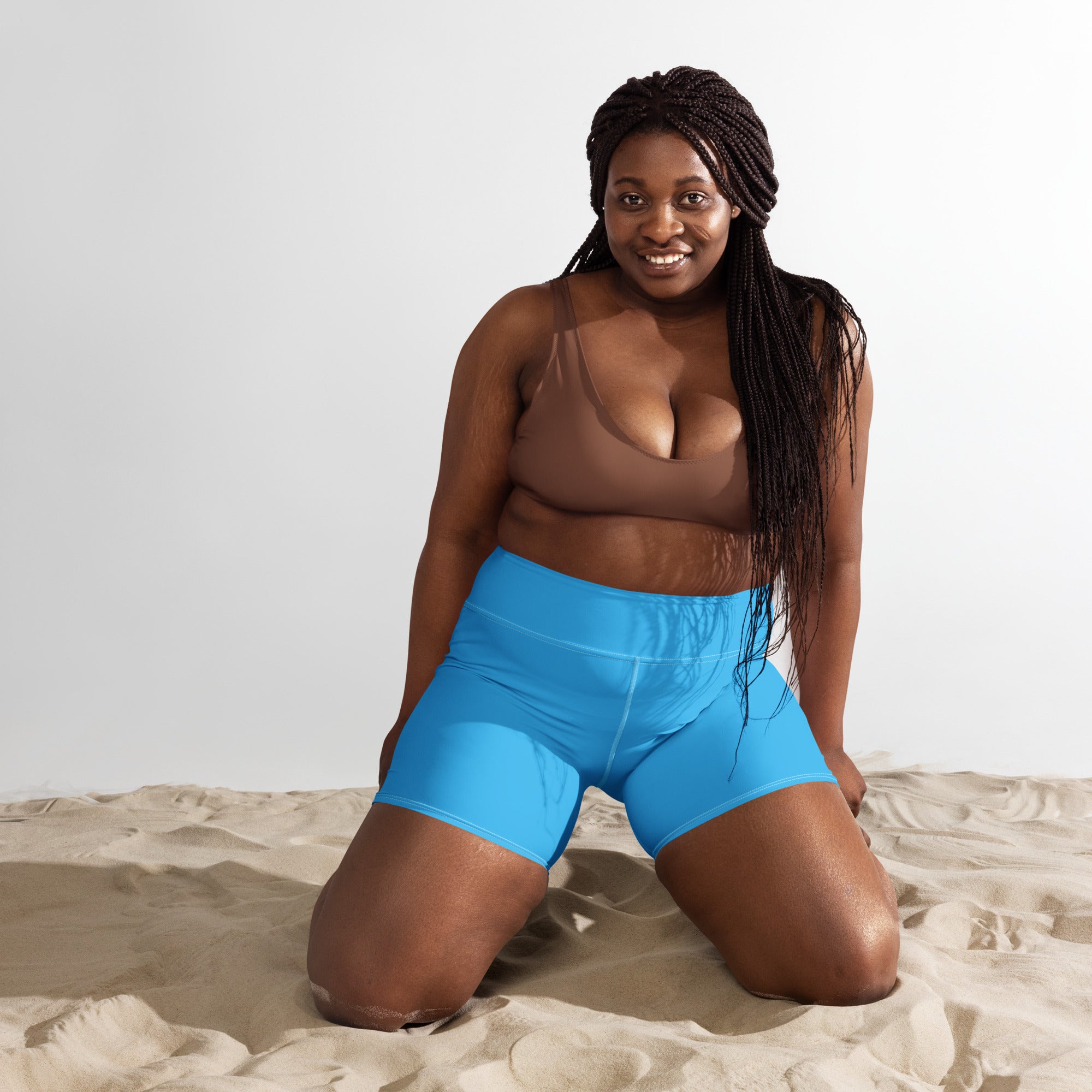 Bright blue high waisted buttery soft yoga shorts for women made from soft active fabric for comfort and flexibility