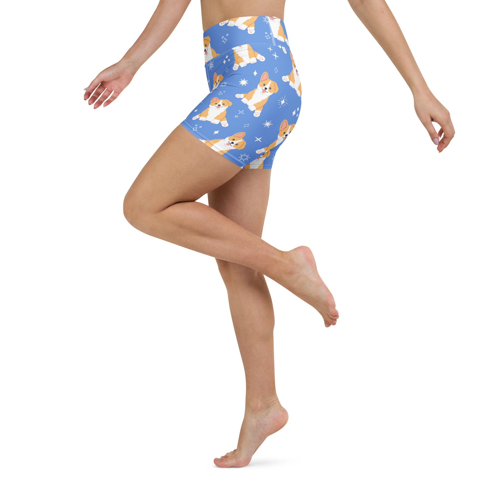 Women’s blue high waisted buttery soft yoga shorts with playful orange and white corgi dog pattern and sparkles
