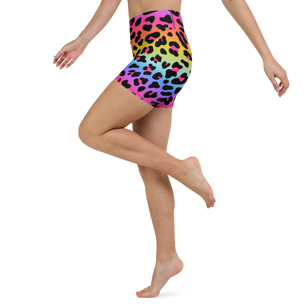 Women’s high waisted buttery soft yoga shorts with vibrant rainbow leopard print in bold pink yellow and blue hues