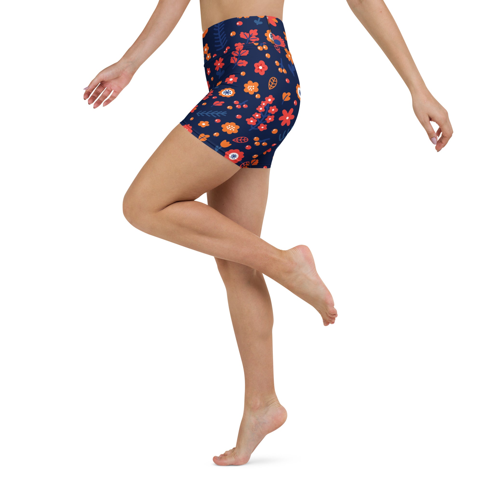 Women’s navy high waisted yoga shorts with orange red floral print made of buttery soft active fabric