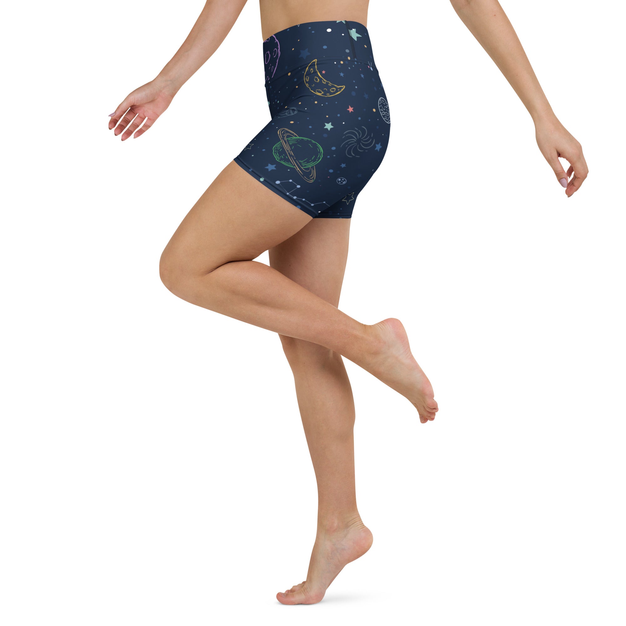 Women’s colorful galaxy space yoga shorts in dark blue high waisted buttery soft fabric with neon celestial prints