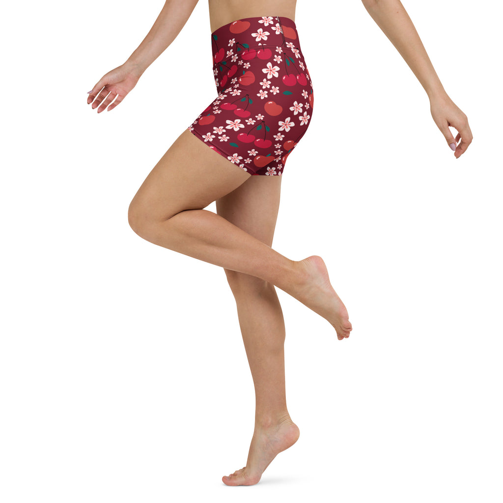 Women’s maroon high waisted buttery soft yoga shorts with red cherry and white blossom pattern for activewear