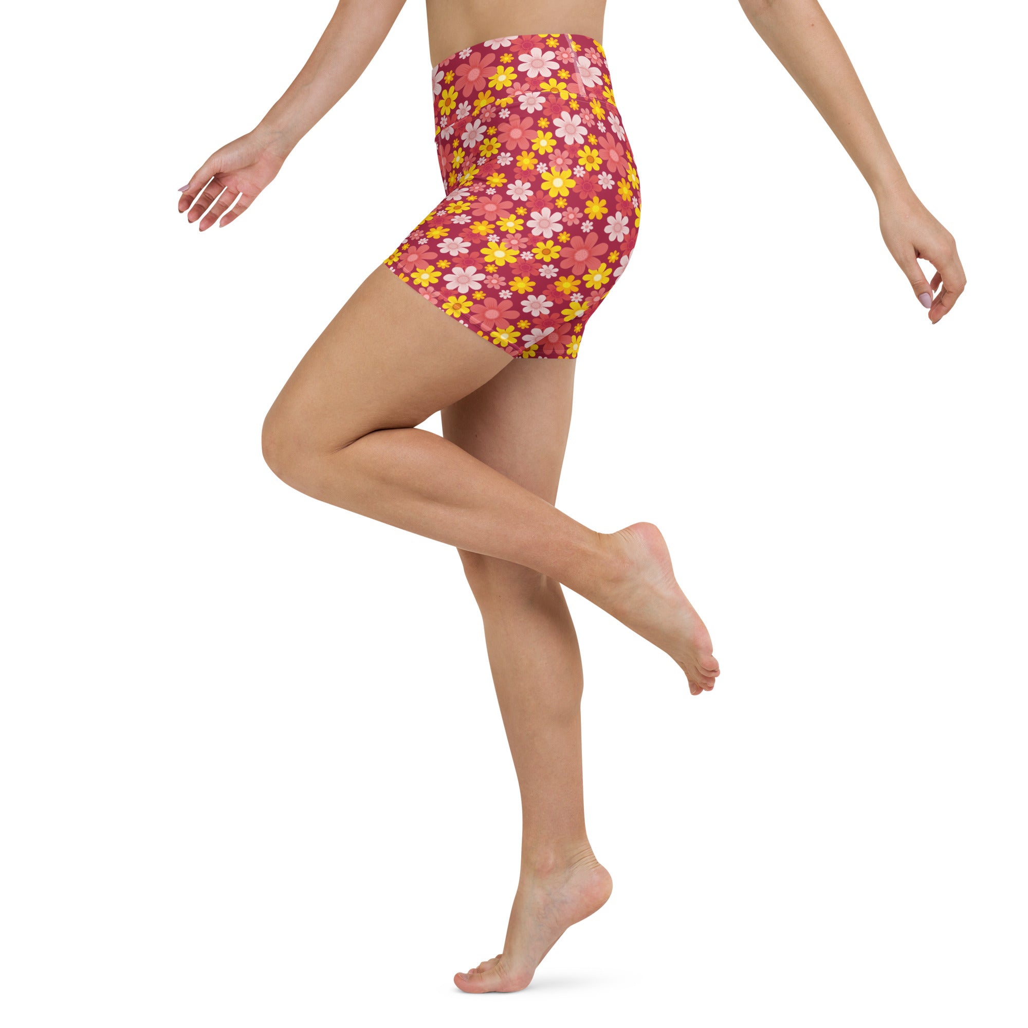 Women’s red high waisted floral yoga shorts with pink yellow and white blossoms in buttery soft fabric